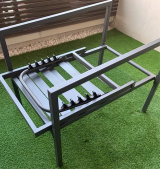 Tumbona gris con reposapiés. Nuevo a estrenar