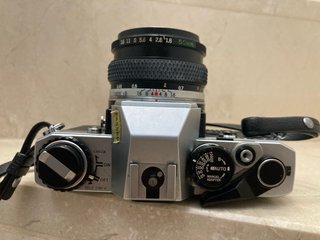 Olympus OM-10 + Zuiko 50mm f/1.8