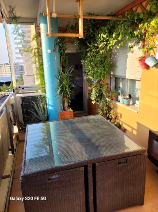 Mesa de jardín con sillas