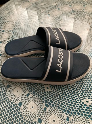 Chanclas Lacoste azules y Blancas
