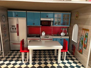 Casa de muñecas de madera