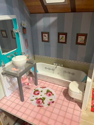 Casa de muñecas de madera