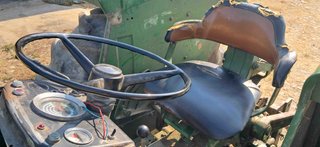Tractor John Deere 1520 con equipo motor nuevo.