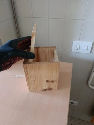Casita para pájaros de madera