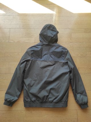 Chaqueta infantil gris y naranja