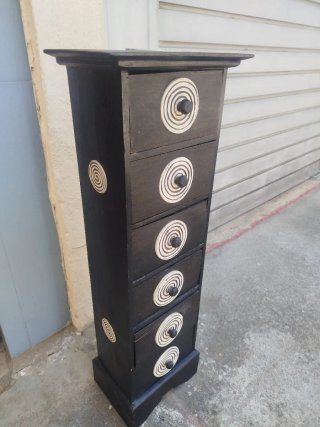 Sinfonier madera estilo étnico negro.