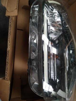 Faro Dacia Duster derecho 2009
