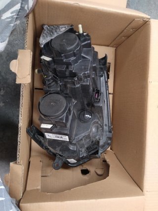 Faro Dacia Duster derecho 2009