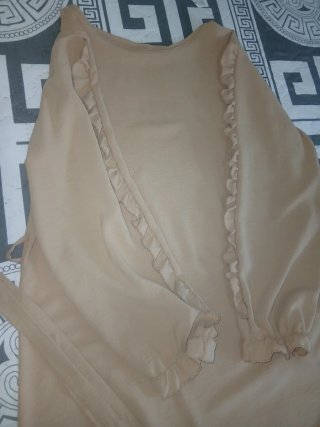 Conjunto de pantalón y blusa beige