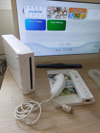 Nintendo Wii + Mando + Juego Wii Sports