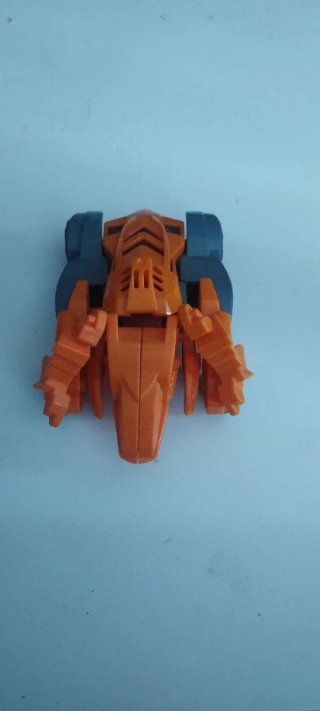 Dinocars Juguete Transformable Azul y Naranja