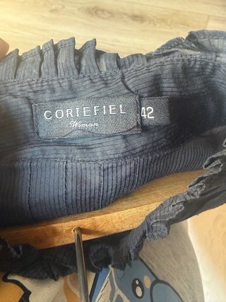 Blusa negra semitransparente Cortefiel
