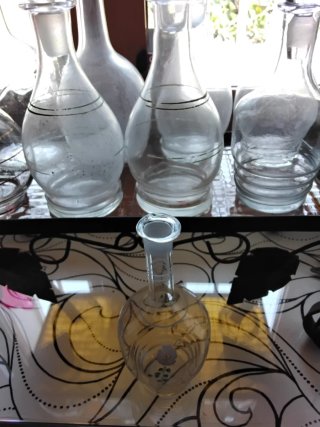 Lote 9 botellas antiguas de cristal.