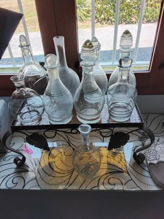 Lote 9 botellas antiguas de cristal.