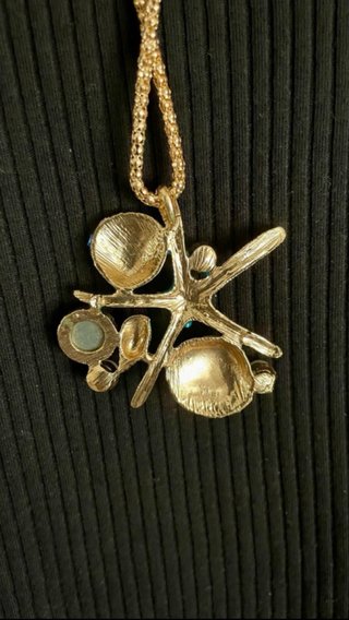 Collana con ciondolo stella marina e conchiglie