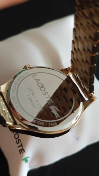 Reloj Lacoste dorado original con caja – excelente