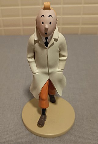 FIGURA TINTIN CON GABARDINA