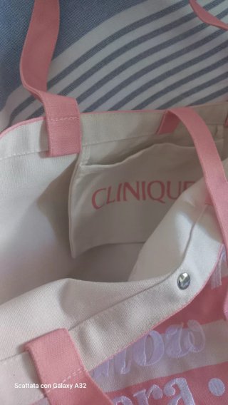 Borsa Clinique a righe rosa e bianche