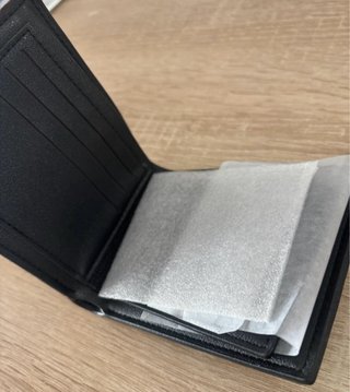 Cartera oscura polipiel