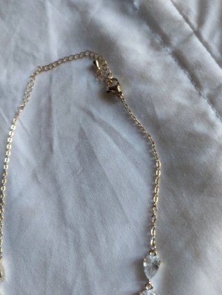 V501 Collana inox  oro con pietre a goccia luccica