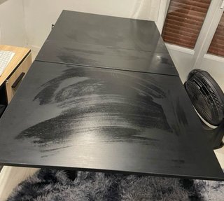 Mesa de comedor de madera negra