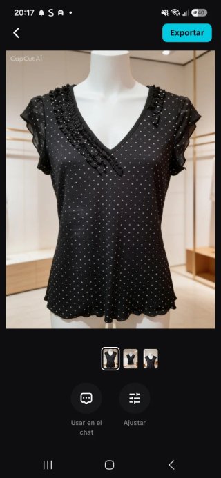 Blusa negra con lunares blancos