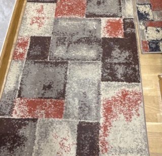 Alfombra geométrica moderna y felpudo pequeño