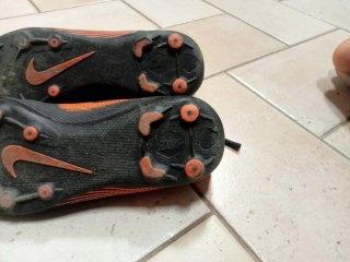 Scarpe da calcio Nike Mercurial nere arancioni