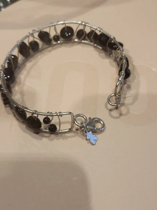 Pulsera Garabato Tous Plata y Onix Rígida