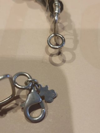 Pulsera Garabato Tous Plata y Onix Rígida