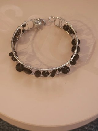 Pulsera Garabato Tous Plata y Onix Rígida