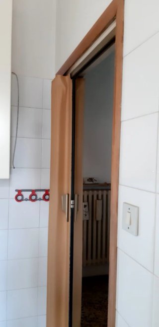 Porta a soffietto morbida beige