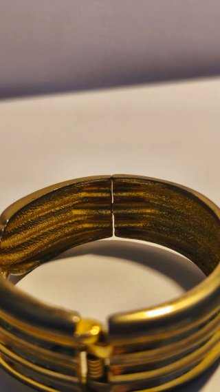 Pulsera vintage dorada diseño retorcido