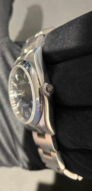 Rolex Oyster Perpetual 116000 caja y papeles