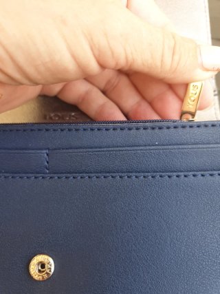 Cartera Tous icónica azul y rosa