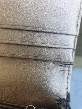 Cartera Tous icónica azul y rosa