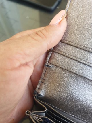 Cartera Tous icónica azul y rosa