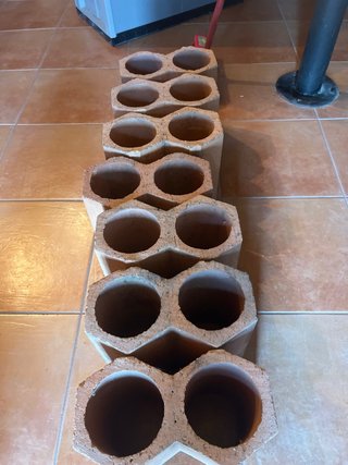 Botelleros de terracota apilables