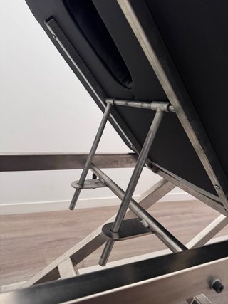 Camilla eléctrica de fisioterapia.