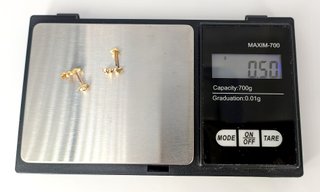 Pendiente Osos de oro de 18k, 0.5 g.