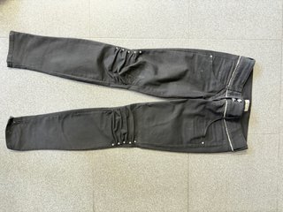 Pantalones negros mujer con adornos