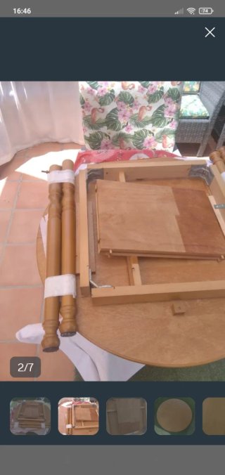 Mesa redonda de madera maciza extensible