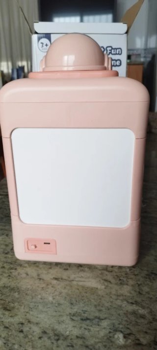 Máquina de gancho de juguete rosa
