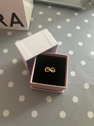Anillo Pandora Nudo Infinito Dorado