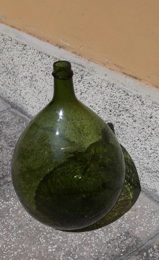 Damigiana in vetro verde