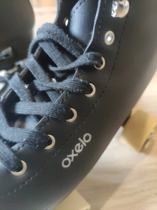 Patines Oxelo 4 ruedas negros