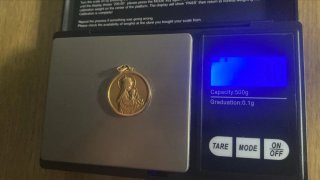Medalla Sagrado Corazón de oro de 18k