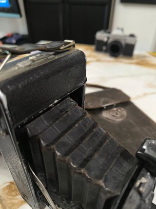 Cámara Agfa fuelle vintage con estuche