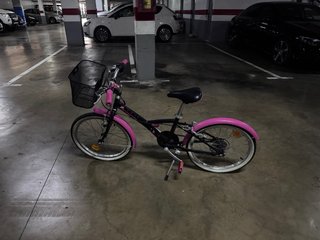 Bicicleta rosa niña con cesta