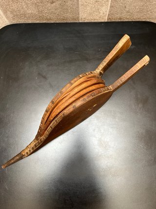 Fuelle antiguo de chimenea madera